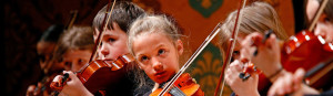 Children playing violin